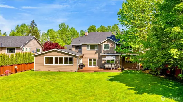 Large, level lot with sweeping lawn is sure to please!