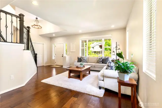 Handsome hardwoods and a welcoming staircase.