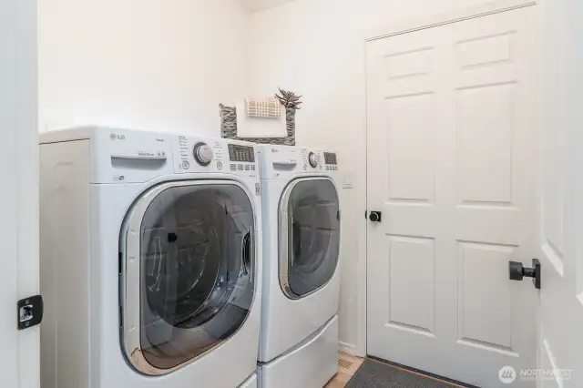 Main floor laundry. One of two laundry rooms.
