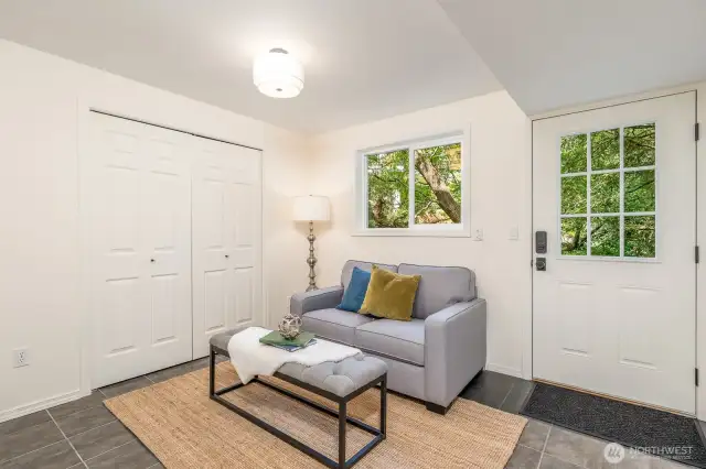 Lower level entry can easily function as living/den/dining if turning lower level into a MIL-suite.