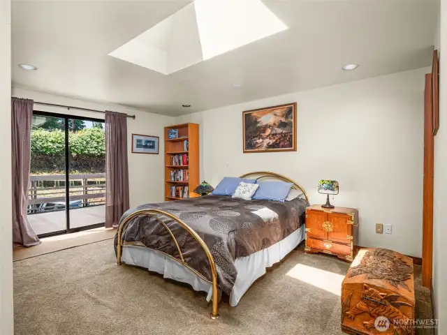 Upper bedroom with wet bar.