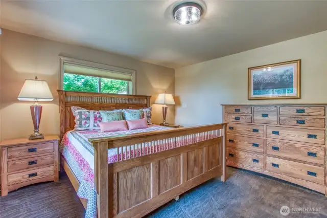Lower level has two bedrooms flanking a full bath.