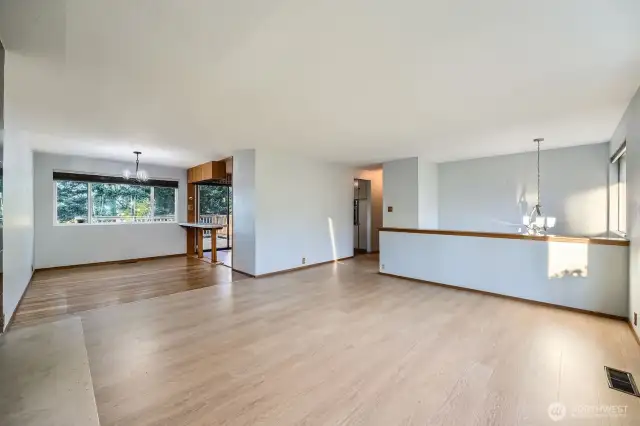 Dining room overlooks deck and backyard