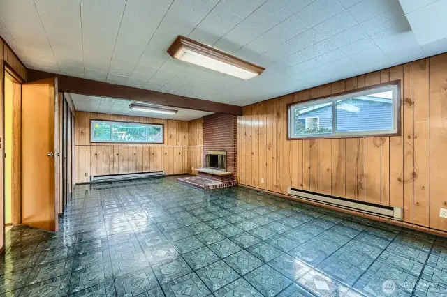 Great room looking North with baseboard heat