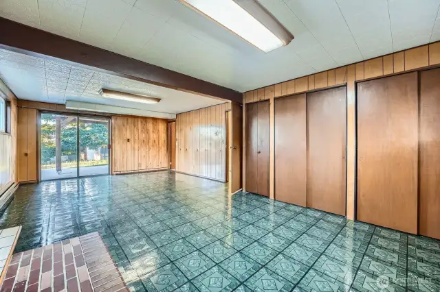 Great room with wall of storage closets