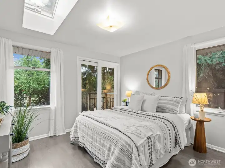 At the end of the hall is the 2nd bedroom with access to the backyard.