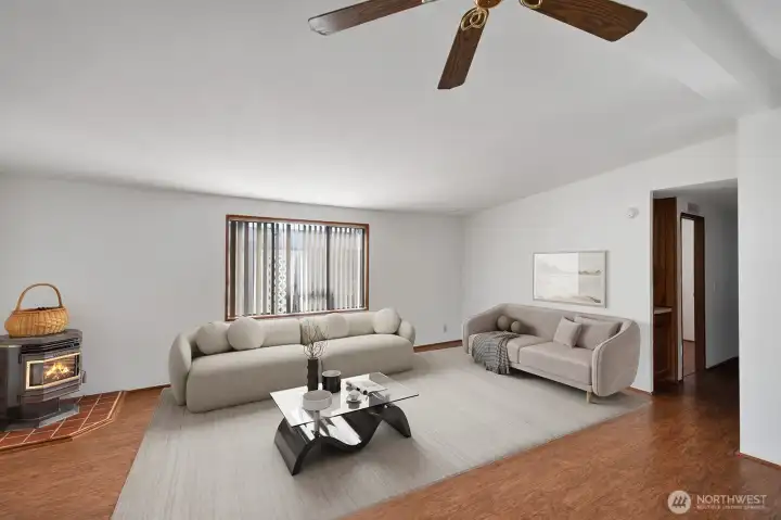 Another view of the formal living room area. Get a sense of the size and how much furniture it will easily accommodate. Virtually staged.