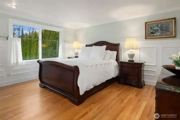 Second bedroom with views of the meticulously maintained park like setting.