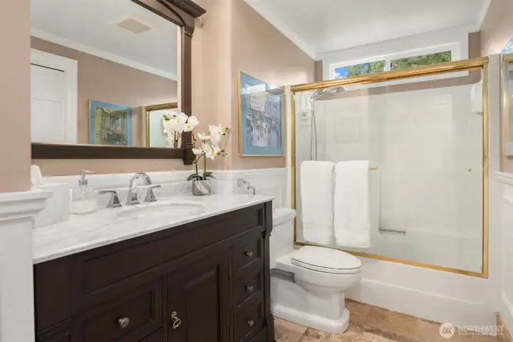 Perfect updated full bath, heated floors and laundry area.