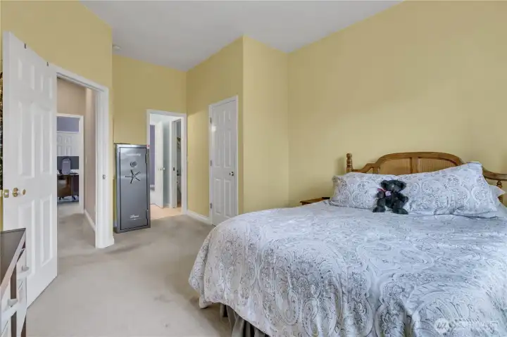 Guest Suite #1 features convenient access to a Jack & Jill full bath shared with Guest Suite #2, offering comfort and functionality for guests.