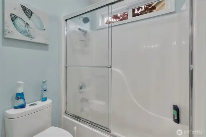 Jack & Jill bath featuring a dedicated shower area, designed for convenience and functionality.