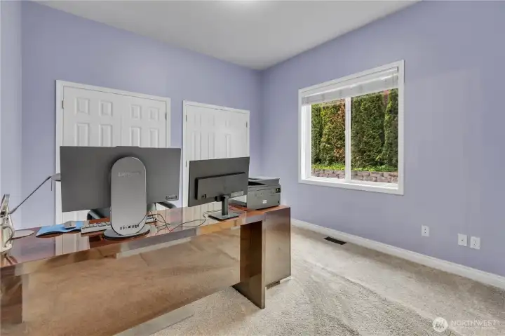 Guest Suite #2 features double closets, offering ample storage and added convenience.