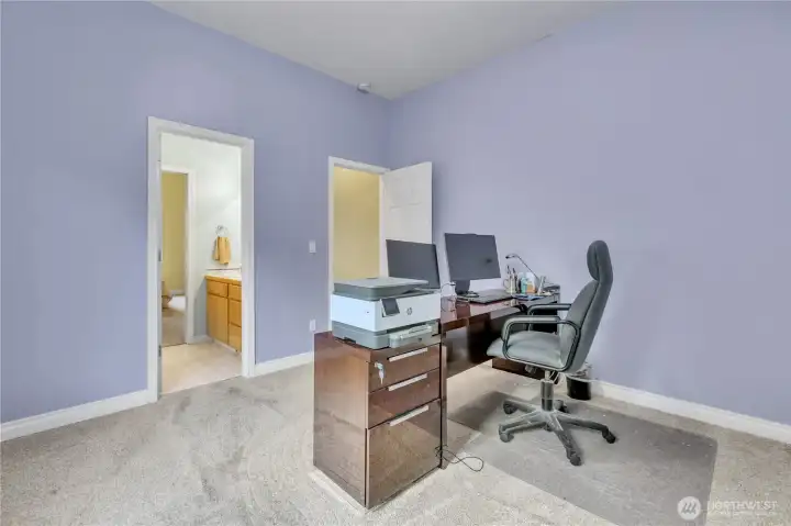 Guest Suite #2 with access to a Jack & Jill bath, offering comfort and convenience with a shared bathroom layout.