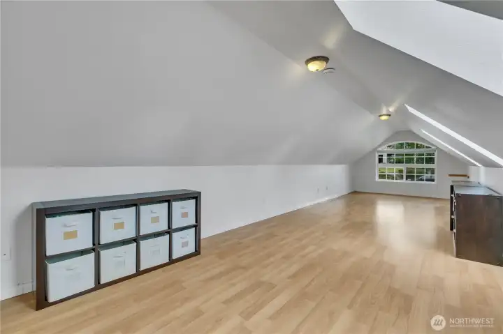 Great bonus room space located above the garage, offering flexible use for a media room, office, or guest retreat.