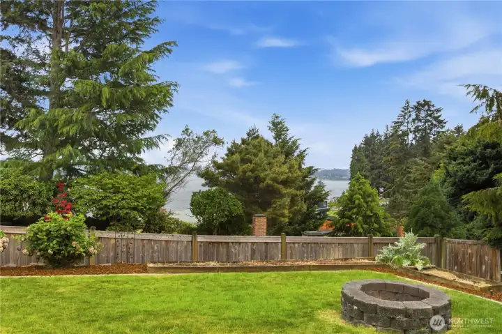 View from the great deck andBeautiful view from the expansive deck and firepit area—perfect for relaxing, entertaining, and enjoying the outdoors. firepit to enjoy