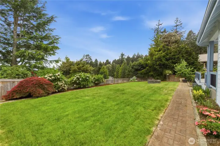 Low-maintenance, well-manicured yard offering easy upkeep and great curb appeal.