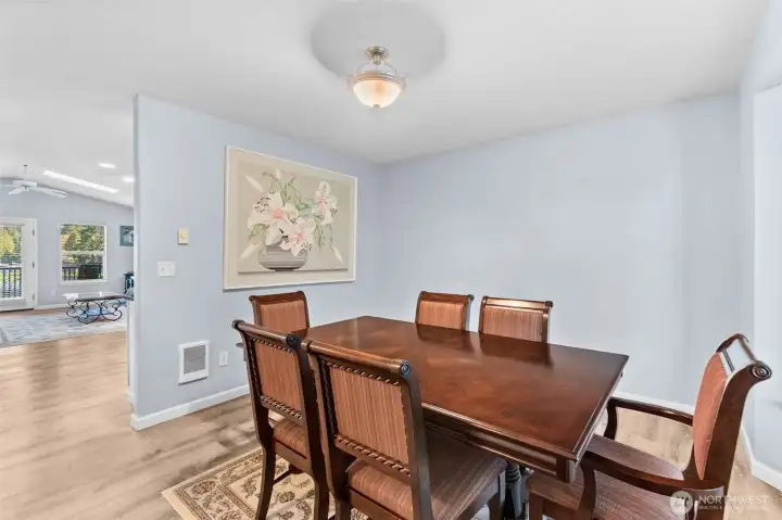 There's plenty of space here for a large dining table so hosting the next gathering is a snap! Dining is conveniently located near the kitchen.