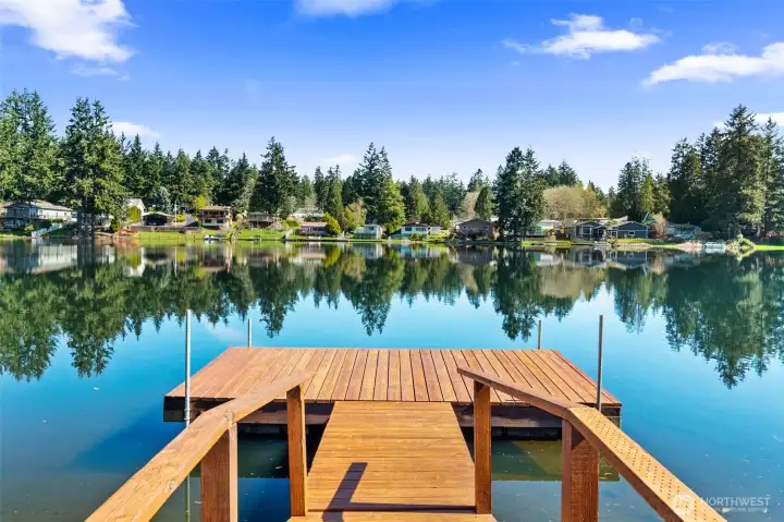 Ready for the annual fishing derby? Or summer sunning? The dock was refreshed with new top and bridge boards in 2024.