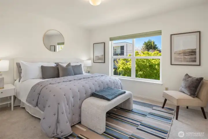 Boasting brand new carpet and fresh paint throughout the upper floor there are 3 bedrooms. This is the king sized primary with a walk-in closet.