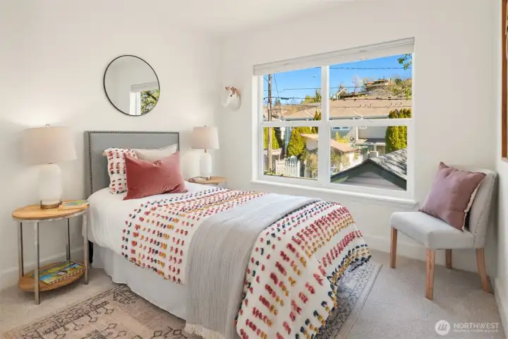 The third of three bedrooms located upstairs. All have new carpet and paint and good sized closets.