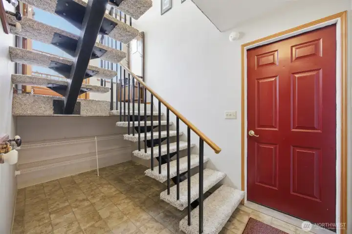 Convenient access from the garage to the lower level of the home. Convenient access from the garage to the lower level of the home.