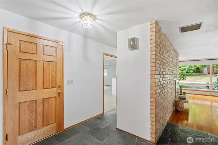 The entry opens to a slate floor; formal Living/Dining areas to the right, and Kitchen, Family Room and breakfast dining to the left. The entry opens to a slate floor; formal Living/Dining areas to the right, and Kitchen, Family Room and breakfast dining to the left.