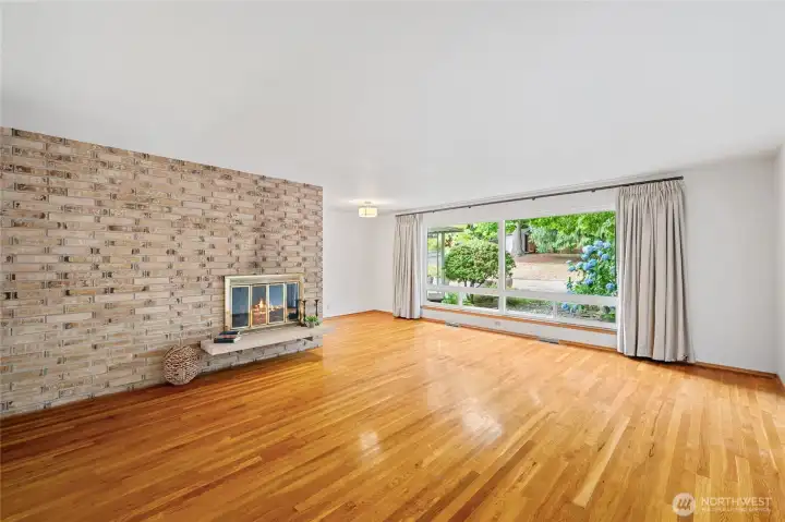 The view shows an expansive back yard that is fully fenced. The view shows an expansive back yard that is fully fenced.
