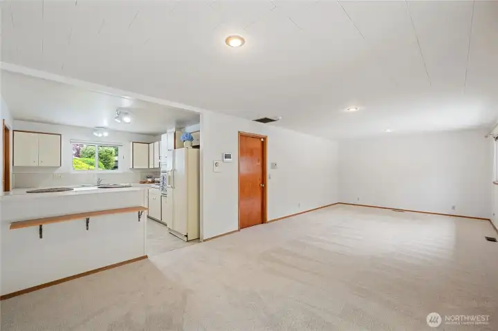 Door leads to the two-car garage with utility room. Door leads to the two-car garage with utility room.