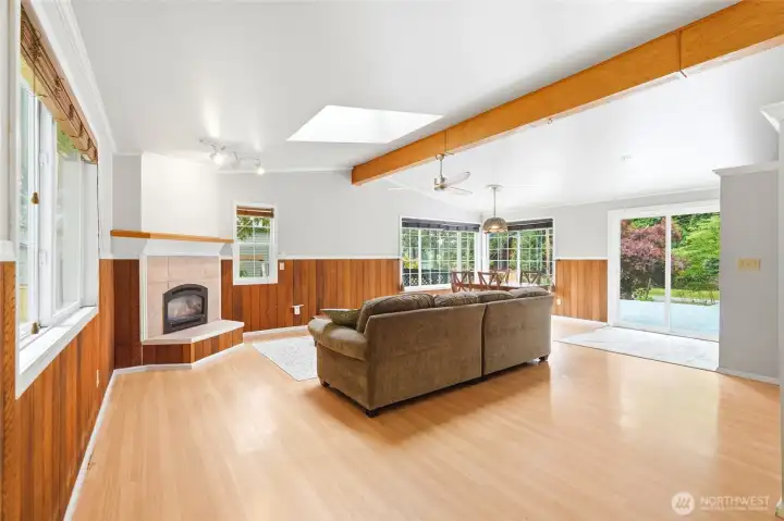 Living room with motorized skylight for easy ventilation in hot weather. Living room with motorized skylight for easy ventilation in hot weather.