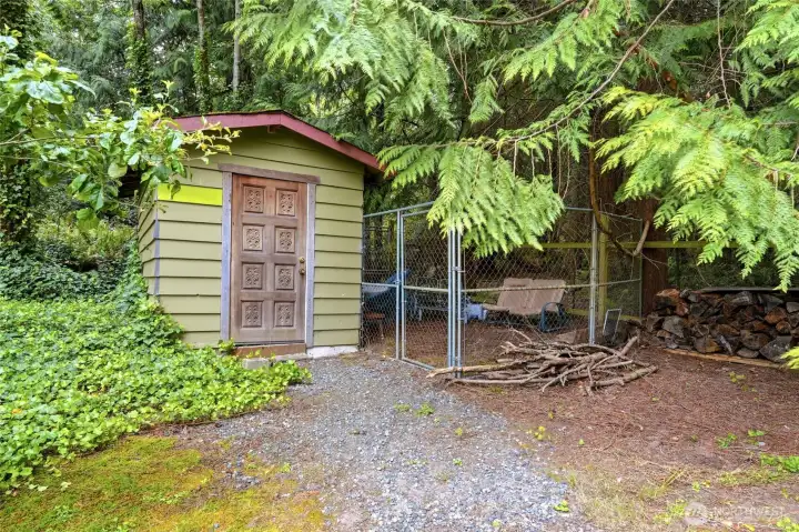Garden shed and storage/dog run providing secure outdoor spaces. Garden shed and storage/dog run providing secure outdoor spaces.