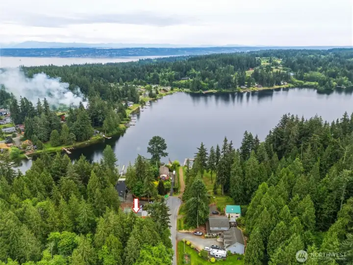 Whidbey Island home with access to private community swimming area and lakeside park just steps away. Whidbey Island home with access to private community swimming area and lakeside park just steps away.