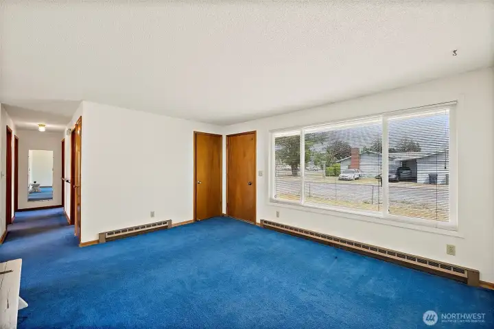 Good size living area, nice coat closet and extra large window.