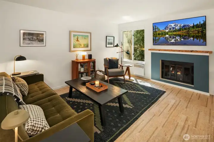 The open main level floorplan is spacious and features eco-friendly cork flooring that is stylish, hypoallergenic and acts as a natural insulator for sound and temperature.
