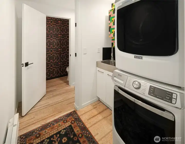 Before the remodel, this was a folding door closet with a washer, dryer and some shelves. The laundry sink was a fantastic addition to the floorplan.