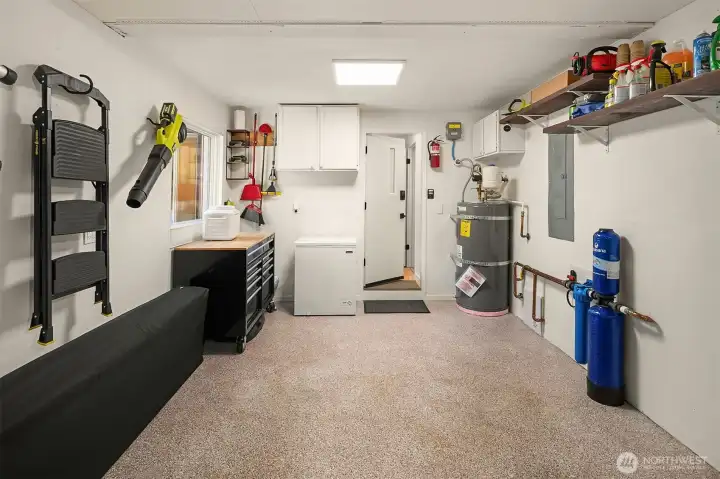 Garage (off the laundry) is completely finished, including protective floor coating. New electrical panel in 2021 plus a whole house water filtration system!