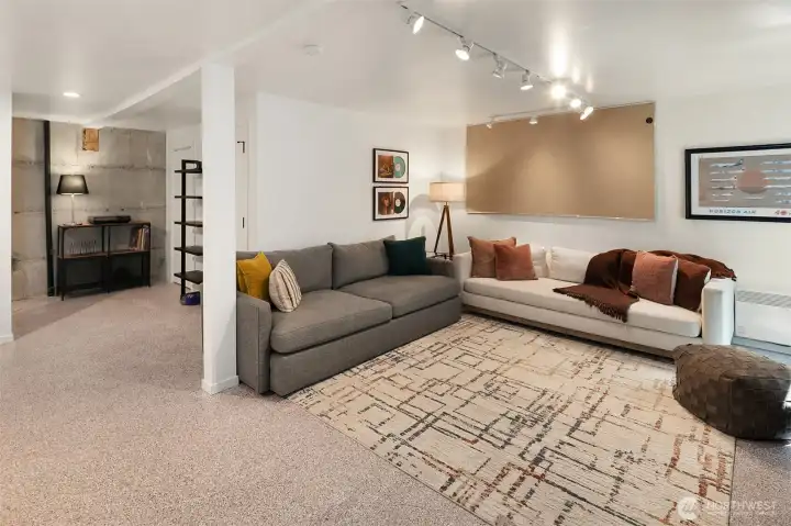 The lower level is open and flexible. Note the durable, coated flooring.