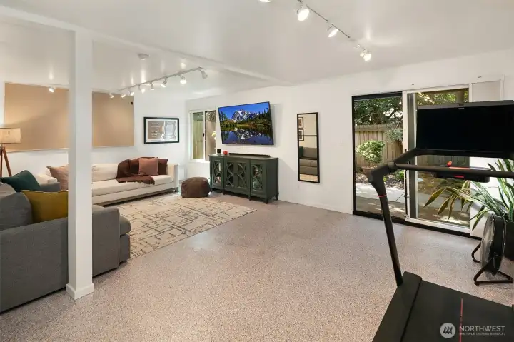 Step through the slider to a lush, private garden patio.