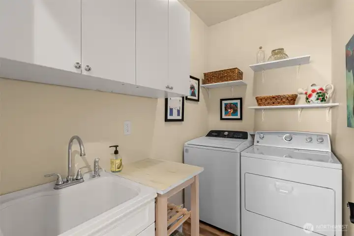 Laundry room with utility sink.