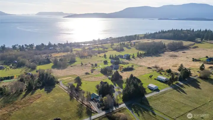 This lovely multi-generational option home and cottage sit on 3.2 acres overlooking the Strait of Georgia, Orcas Island with all day sun and all day big sky views! This lovely multi-generational option home and cottage sit on 3.2 acres overlooking the Strait of Georgia, Orcas Island with all day sun and all day big sky views!
