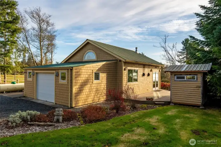 A small garage/workshop attached A small garage/workshop attached