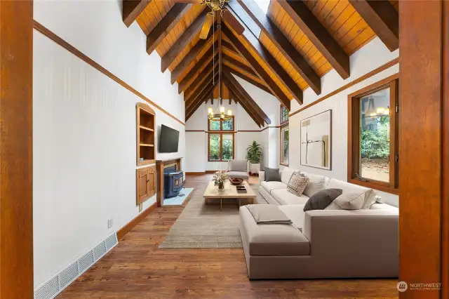 Living Area with Pellet Stove and Wood Wrapped Windows