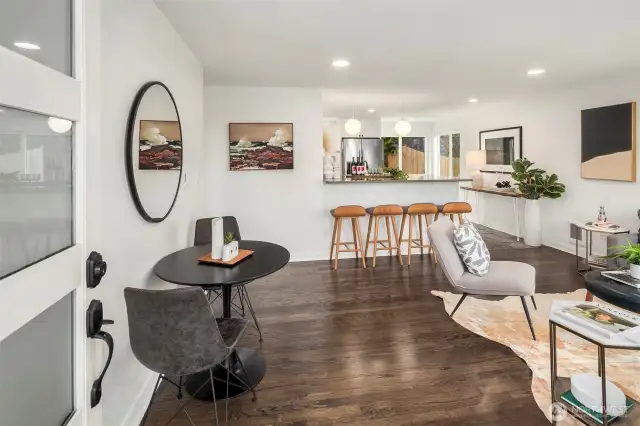 Gorgeous hardwood floors and huge eat-in bar, gorgeous light fixtures from Luxe Lighting, this home is dreamy.