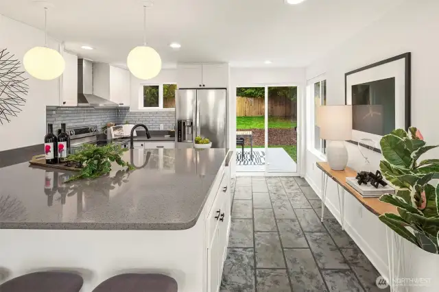 Full upgraded kitchen with stainless appliances and shaker cabinetry. The slider leads to the massive backyard which backs to a beautiful green belt. Always wanted to be a bird watcher? Now's your chance!