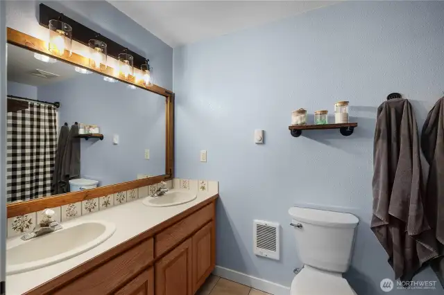 Dual sinks primary full bathroom