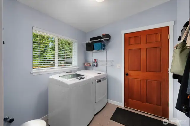 You can enter this nicely recently painted utility room from the kitchen or the garage.
