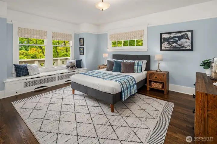 The 2nd of 3 additional bedrooms on the 2nd floor - facing east, with access to the front upper deck, via the Jack + Jill bathroom, just out of view here.