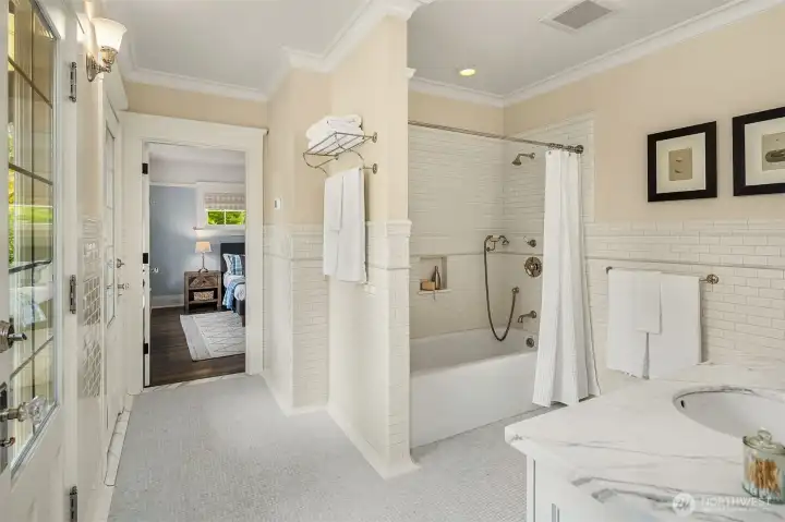 Lovely Jack + Jill bath serves the 1st + 2nd bedroom and offers access to the 2nd floor porch.