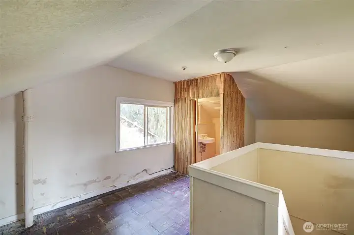 Maybe expand the current bathroom into the loft and make it a full bathroom.