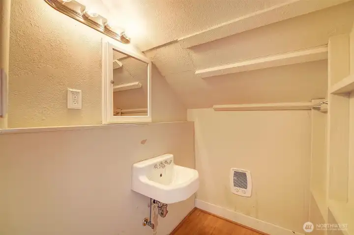 Upstairs half bathroom (needs toilet)