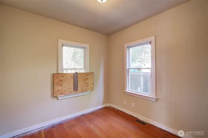 2nd main floor bedroom, also light filled. (needs a new window)